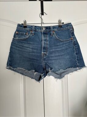 Levi's 501 Medium Blue Distressed High-Rise Jean Shorts